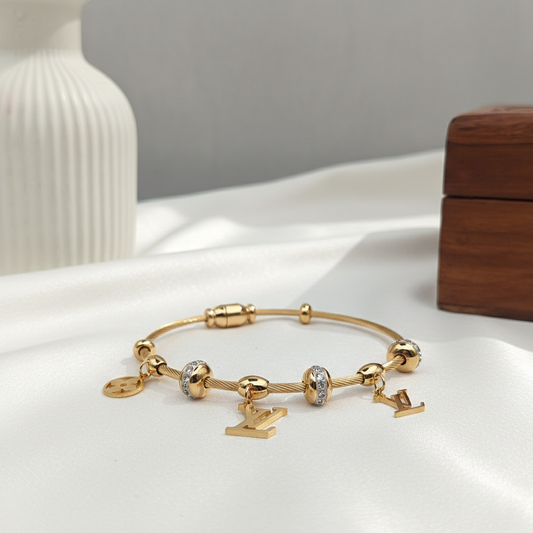 Cable Charm Bangle with Crystal Beads & Floral Accents