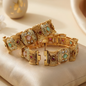 Gold Toned Meenakari Kundan Bangle Set