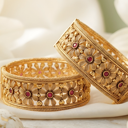 Gold Toned Floral Bangle Set with Red Stone