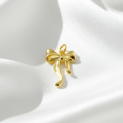 Golden Bow Charm – Mini Ribbon Pendant