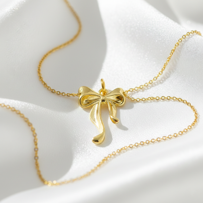 Golden Bow Charm – Mini Ribbon Pendant