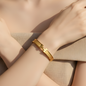 Gold "H" Detail Hinged Bangle