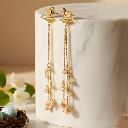 Golden Bird-Motif Tassel Earrings with Pearl Droplets